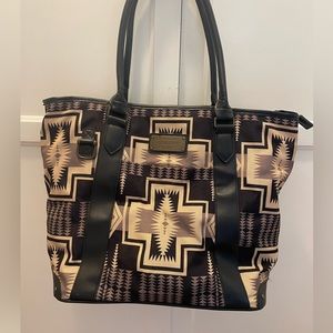 Used The Harding 20" Travel Tote from Pendleton.